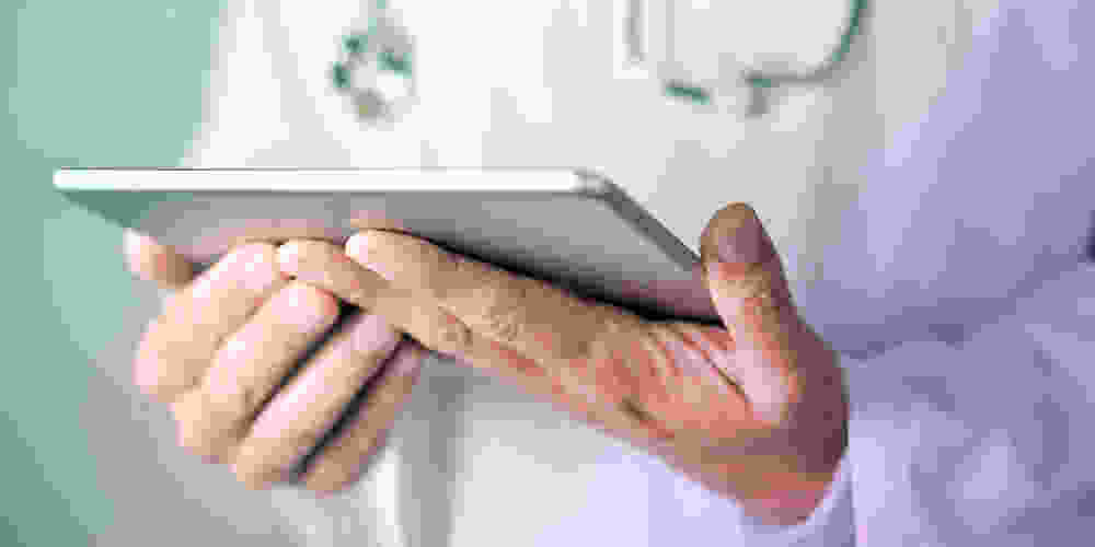 Doctor holding a tablet