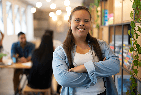 Woman with a disability looking confident in a cafe