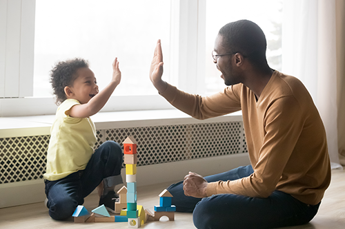 Happy-Black-Dad-And-Toddler.png