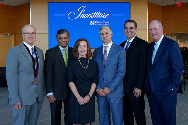 Dean Terence R. Flotte; newly invested faculty members Vaikom S. Mahadevan, MD, Sharon B. Cantor, PhD, Andres Schanzer, MD, and Michael A. Brehm, PhD; and Chancellor Michael F. Collins.  