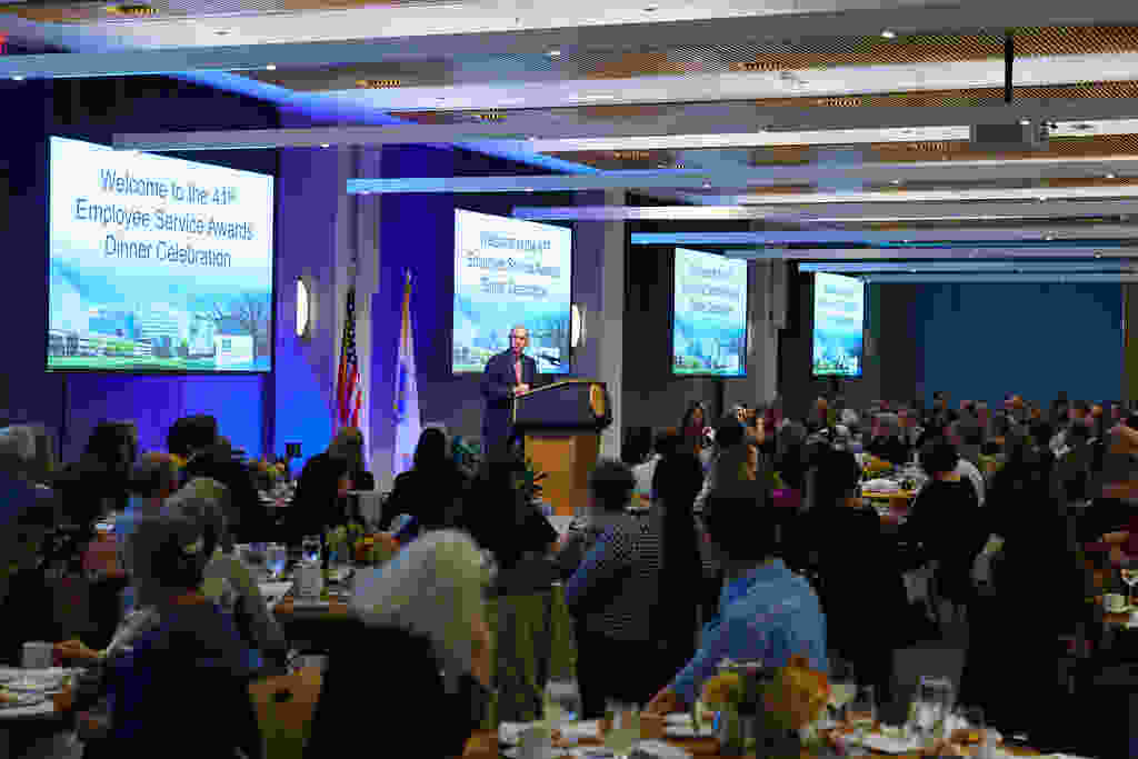 Chancellor Dr. Michael Collins addresses our employees during the recognition dinner.