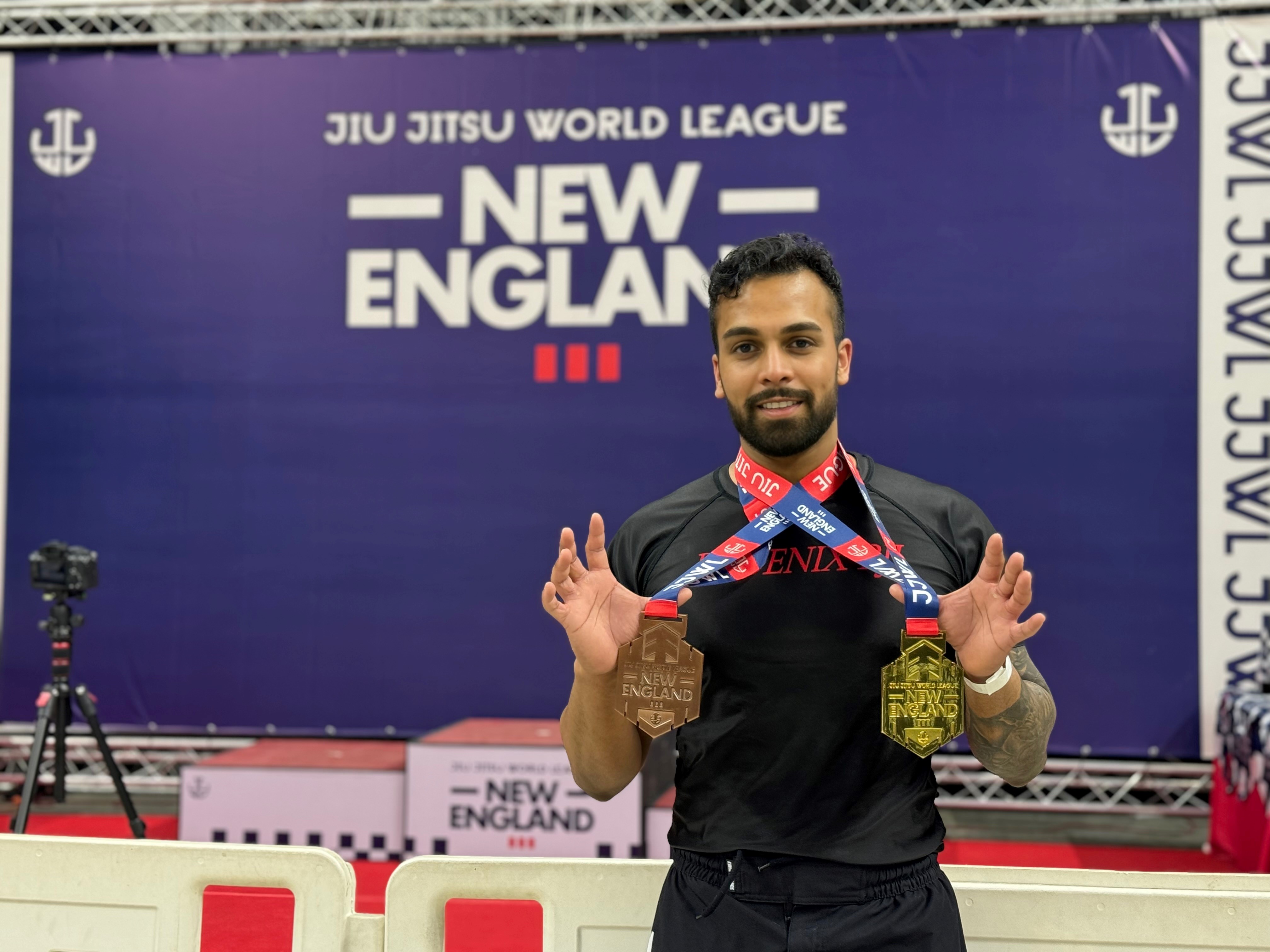 Danison Emmerson, MD, wearing competition winner medals at the  ju jitsu world league new England competition