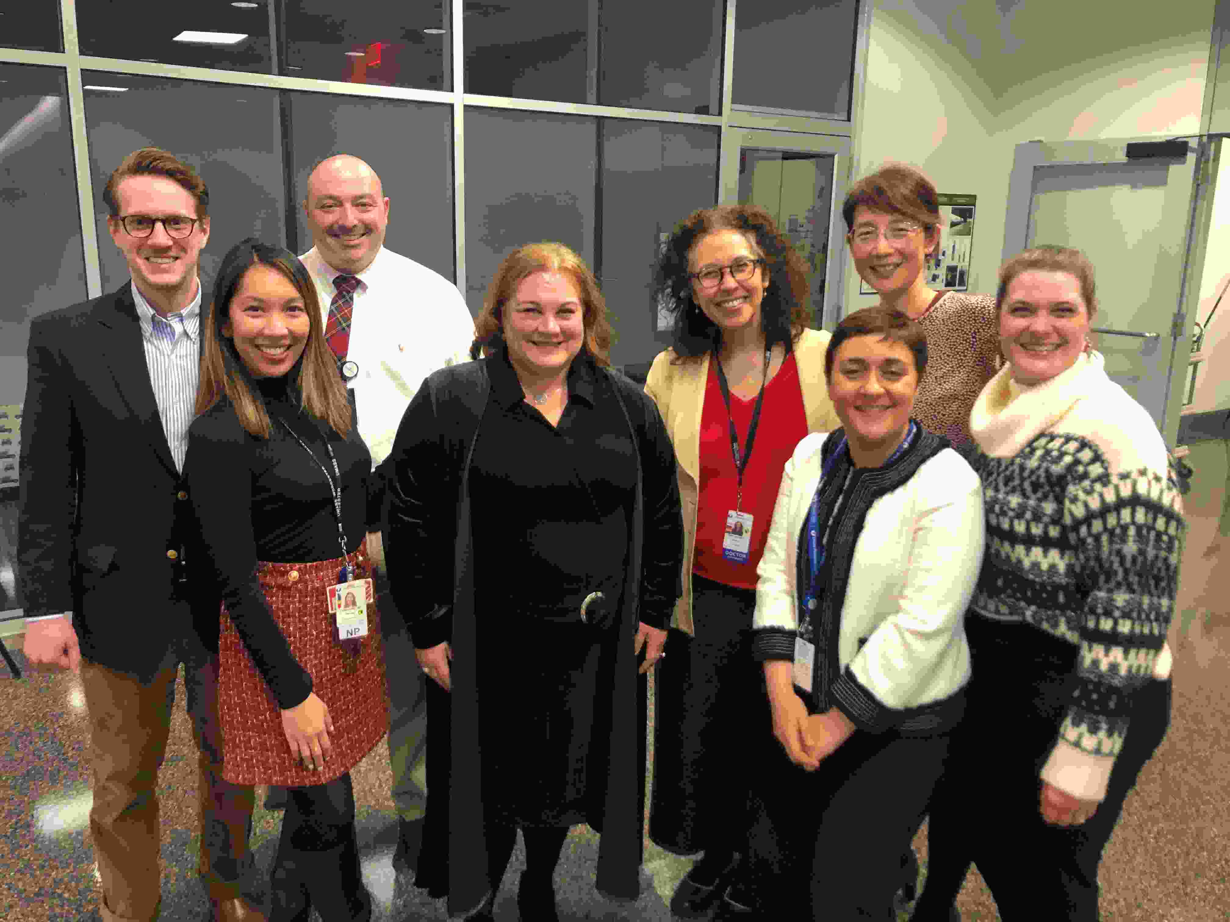 Epilepsy Center team members posing for photo with Dr. Barrett