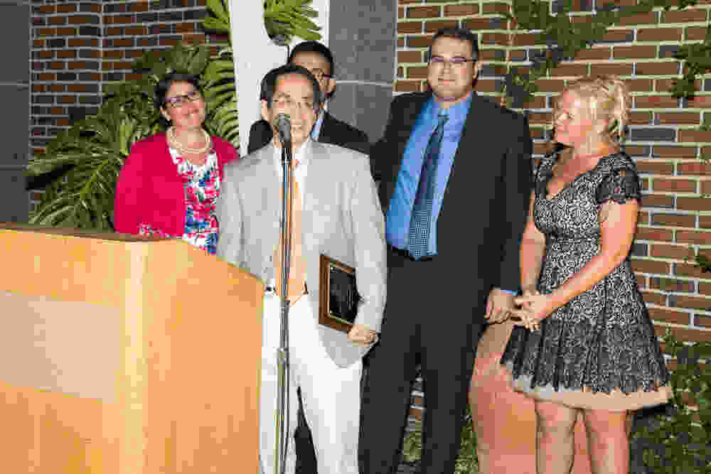 Radiology Residents present Dr. Larry Zheng with the Teacher of the Year award