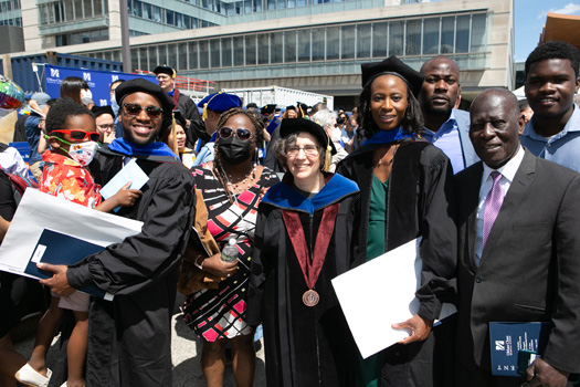 Celia Schiffer, PhD, professor and chair of biochemistry and molecular biotechnology (center) with her two PhD mentees, Jacqueto Zephyr, left and Anne Myrline Jecrois, right.