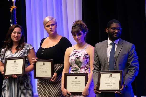 Student award winners, from left, are Aisling Ryan, Gretchen Peery, Emily Davenport and Ezequiel De Leon.