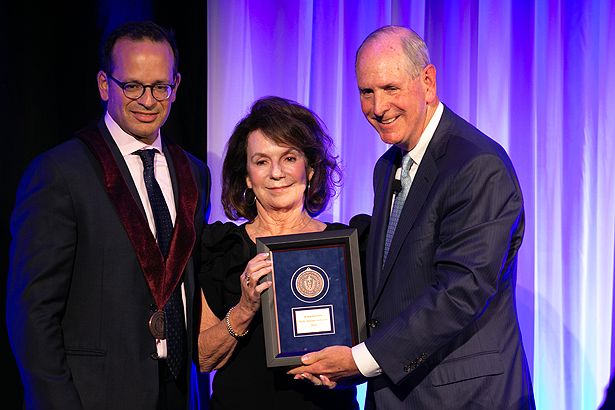 Justin A. Maykel, MD, is invested as the inaugural holder of the Joseph M. Streeter and Mary Streeter DeFeudis Chair in Surgery by Mary Streeter DeFeudis and Chancellor Collins.