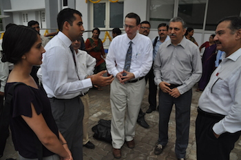 Pictured at the Sonaba Hospital in Gujarat, India are Research and Advocacy for Health in India cofounders (from left) Nisha Fahey, Apurv Soni, Jeroan Allison, MD, and Somashekhar Nimbalkar, MD, with a representative of the philanthropy that funded the hospital. 