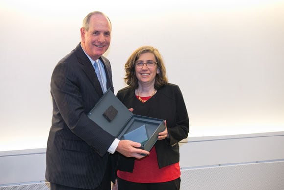 Chancellor Michael Collins and Celia A. Schiffer, PhD, recipient of the Chancellor’s Award for Excellence in Mentoring