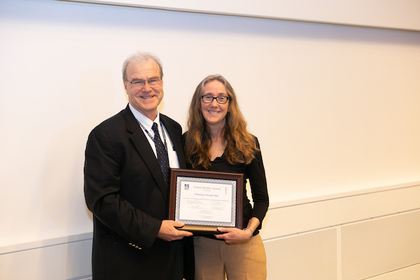 School of Medicine Dean Terence Flotte and Christine Woolf, PhD