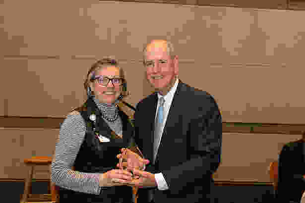 Valerie Wedge accepts the Chancellor’s Award for Advancing Institutional Excellence in Diversity and Inclusion from Chancellor Collins.