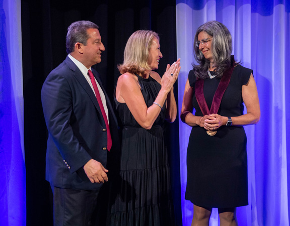 Mary Ellen Lane, PhD, is joined by Robert and Donna Manning.