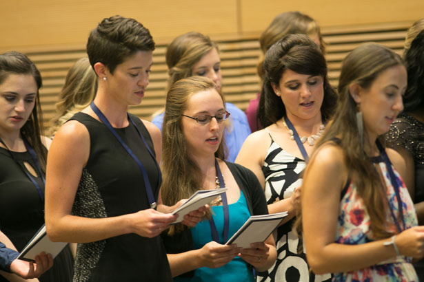 Students recite the nursing pledge.