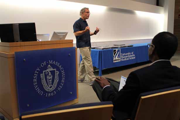 Victor Ambros, PhD, delivers the closing keynote as Summer Undergraduate Research Programs Co-Principal Investigator Brian Lewis, PhD, listens.