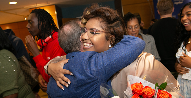 Cheyanne Hill receiving a hug