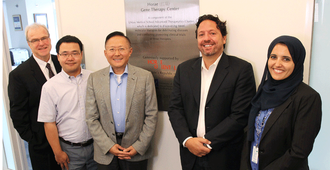 Members of the program project grant team, left to right, include Terence R. Flotte, MD; Wen Xue, PhD; Guangping Gao, PhD; Christian Mueller, PhD; and Mai ElMallah, MD.